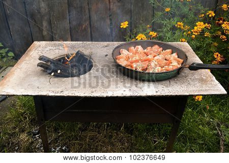Tomatoes grilled over an open fire