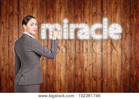 businesswoman touching singboard word