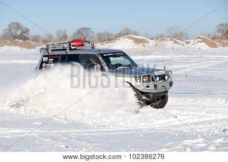 Khabarovsk, Russia - January 31, 2015: Old Mitsubishi Pajero Jumping During Off Road Winter Sprint R