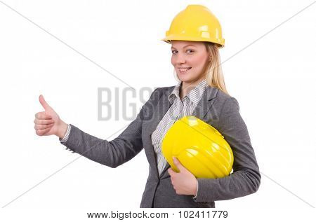 Businesswoman in gray suit and safety helmet isolated on white