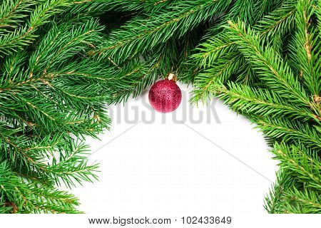 Christmas Background With Fir Twigs And Red Balls Isolated On White