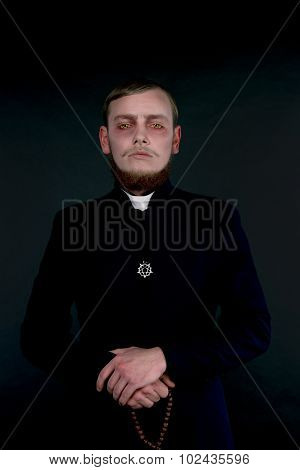 Halloween. A Man Dressed As The Evil Catholic Priest