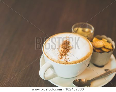 Vintage Tone Of Cup Of Hot Capuchino Coffee On The Brown Table