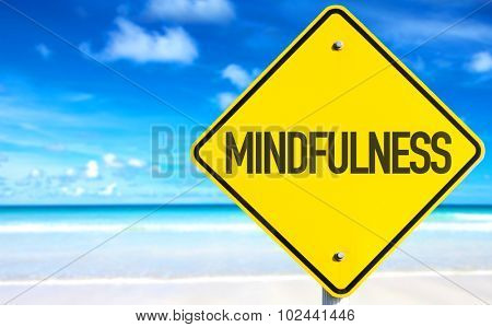 Mindfulness sign with beach background