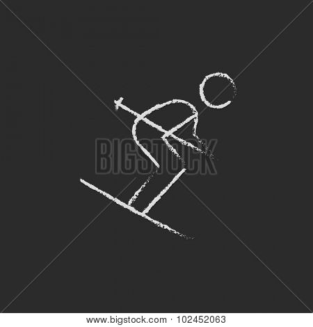 Downhill skiing hand drawn in chalk on a blackboard vector white icon isolated on a black background.
