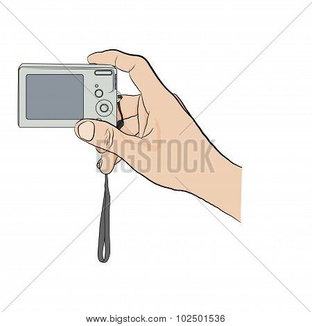 Man holding digital camera.