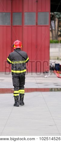 Firefighters In Uniform In The Firehouse