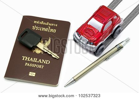 Thailand Passport, Key, Pen And Red 4Wd Car For Travel Concept