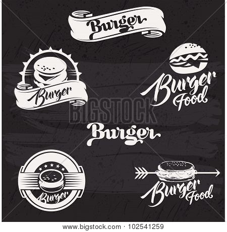 Burgers logo set in vintage style. Retro hand drawn burger logotypes collection.