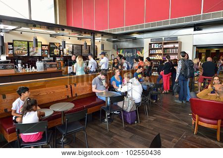 PARIS - AUGUST 08, 2015: Starbucks cafe in Orly Airport. Paris Orly Airport is an international airport located partially in Orly and partially in Villeneuve-le-Roi, 7 NM south of Paris, France