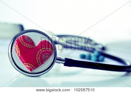 closeup of a red heart on a stethoscope for the cardiovascular health