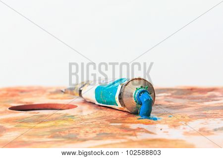 Blue Open Paint Tube With Squeezed Paint