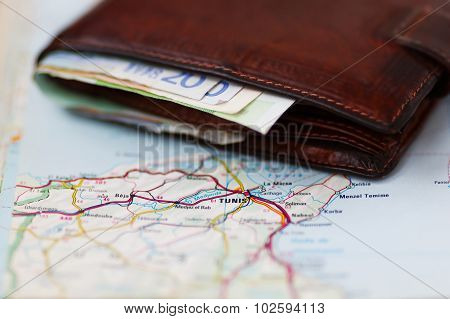 Euro Banknotes Inside Wallet On A Geographical Map Of Tunis