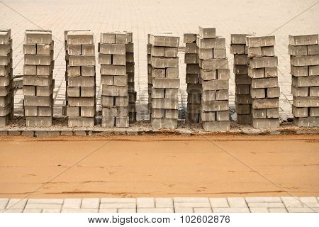 induration sand and laying paving slabs