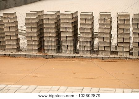 induration sand and laying paving slabs