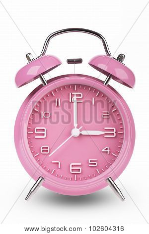 Pink Alarm Clock With Hands At 3 Am Or Pm isolated on white background