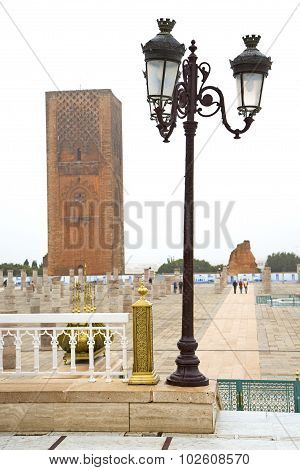 The   Chellah  In Morocco Africa      Street Lamp And Site