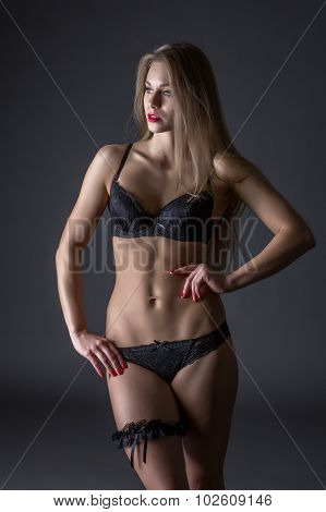 Advertising underwear. Tanned model with fit body