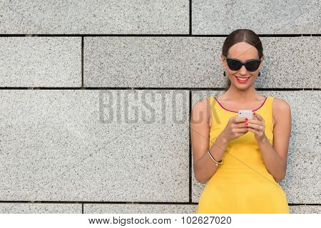Fashion girl with mobile phone