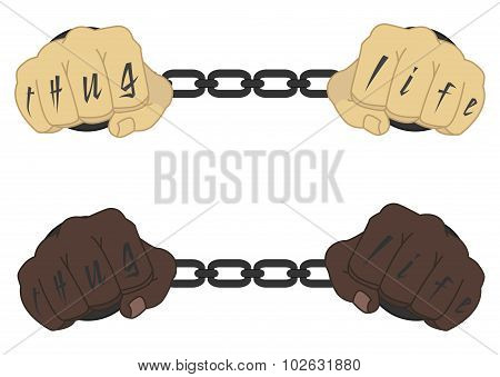 Fist with tattoo in chains
