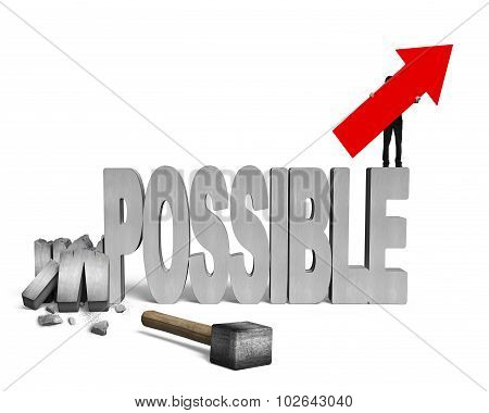 Man Holding Arrow Up Smashed Impossible Word With Sledgehammer