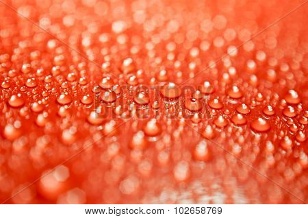 background of water big and small drops on color backdrop