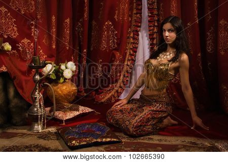 Oriental Woman In A Traditional Costume