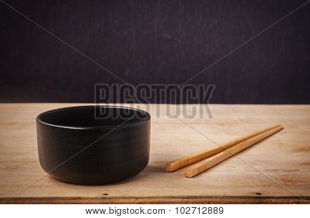 Still Life Black Bowl With Wooden Shopsticks