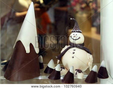 Snowman And A Cone Of White And Dark Chocolate