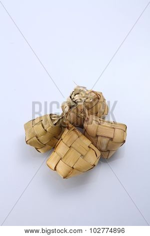Ketupat (Rice Dumpling) On white Background. Ketupat is a natural rice casing made from young coconut leaves for cooking rice during eid Mubarak