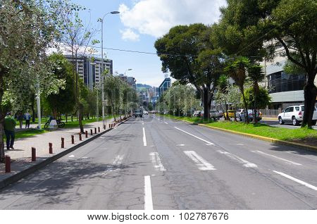 Great image from modern part of Quito mixing new architecture with charming streets and green sourro