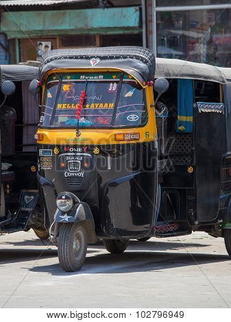 Auto Rickshaw Taxi On A Road In Srinagar, Kashmir, India.