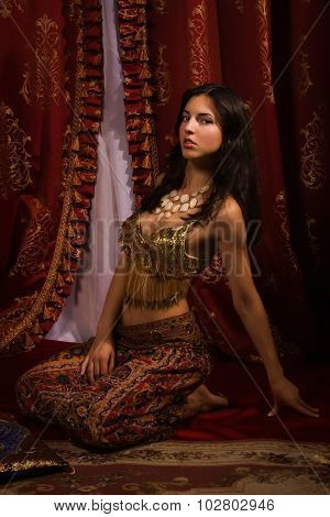 Oriental Woman In A Traditional Costume
