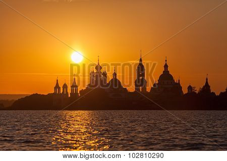 Monastery Silhouette Against The Setting Sun In Rostov
