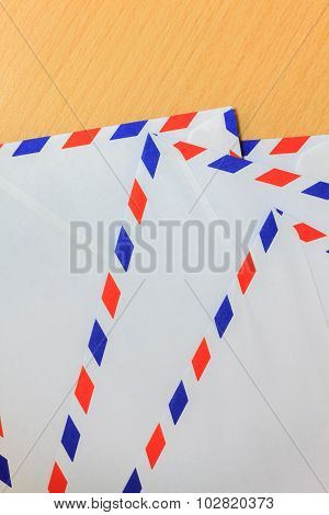 Envelope On Wood Background.