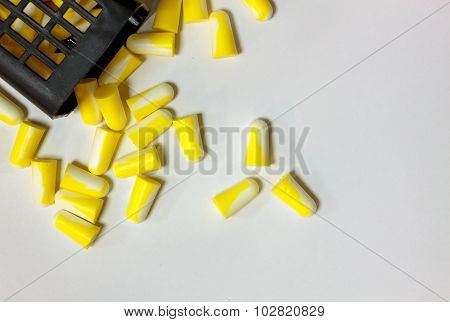 Selective Focus Ear Plug,basket On White Background.