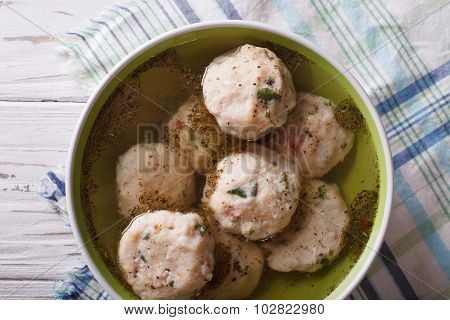 Canederli Soup Close Up On The Table. Horizontal Top View