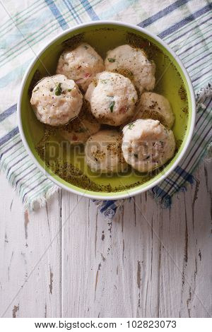 Canederli Soup On The Table. Vertical Top View