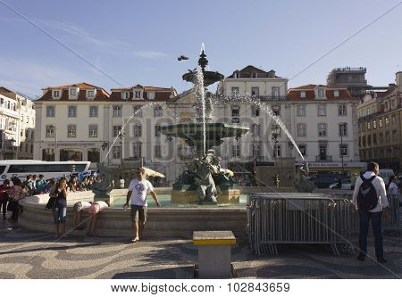 People Along Rossio Square Fountain