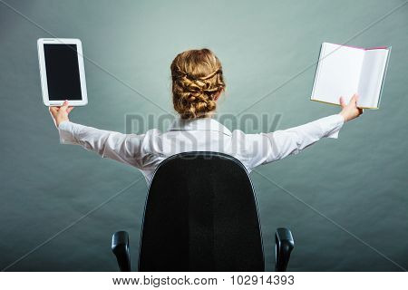 Woman Holding Traditional Book And E-book Reader