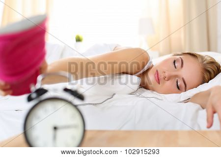 Sleepy Young Beautiful Woman Trying Kill Alarm Clock