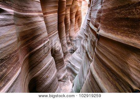 Zebra Canyon is a vivid striped and very narrow gorge. The awesome zig-zag shapes were created by water. Grand Staircase-Escalante National Monument, Utah. USA