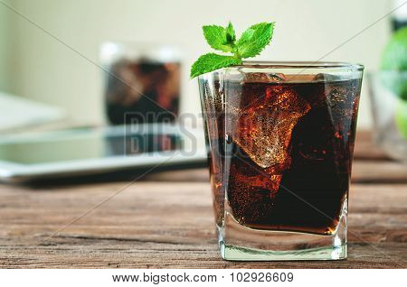 Glass Of Cola Poured To The Brim
