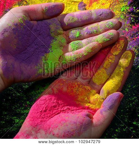 Hands with holi paint