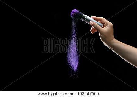 Makeup brush with holi paint
