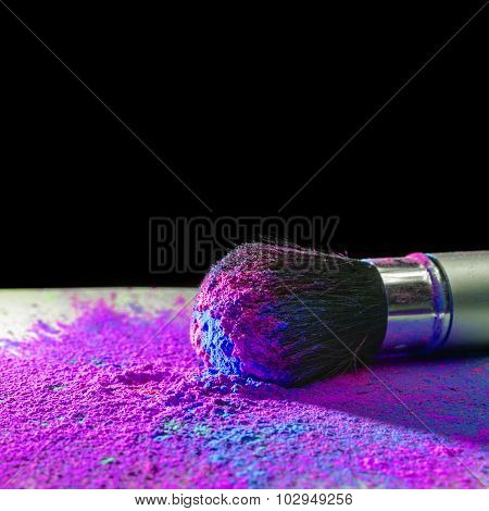 Makeup brush with holi paint