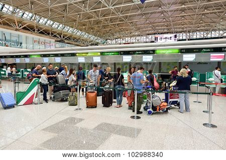 ROME, ITALY - AUGUST 16, 2015: passenger check-in area in FCO airport. Fiumicino - Leonardo da Vinci International Airport is a major international airport in Rome, Italy