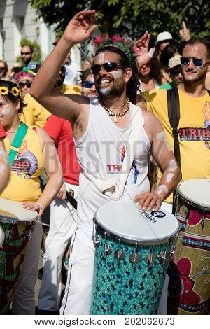 London United Kingdom - August 27 2017. Notting Hill Carnival one of the largest street parties in Europe is now in its 51st year. This year was close to the ruin of Grenfell Tower scene of a devastaing fire.