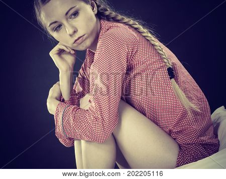 Sad Depressed Young Woman In Bed