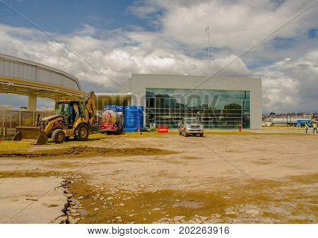 Quito, Pichincha Ecuador - August 27 2017: Beautiful view of the metro construction located inside of the Bicentenario park, with a construction machinery, at north part of the city of Quito.